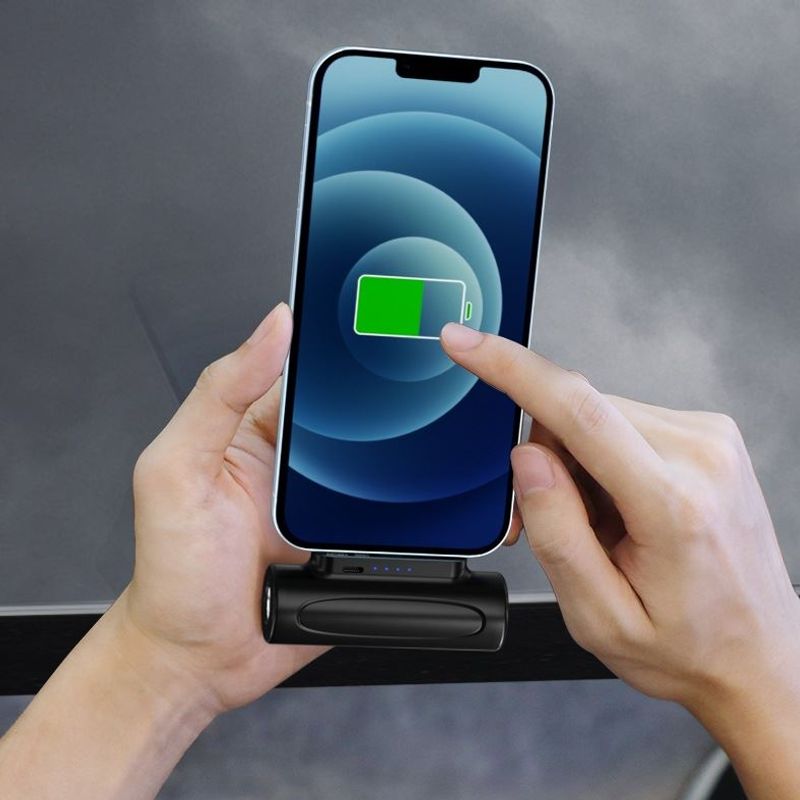 Draadloze mini powerbank met LED lamp - klikt direct handig onder uw telefoon - 5000mAh - Handig en compact, overal uw telefoon opladen - Lightning en USB-C - LED lamp